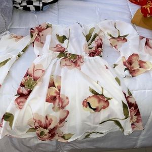 White romper with flowers